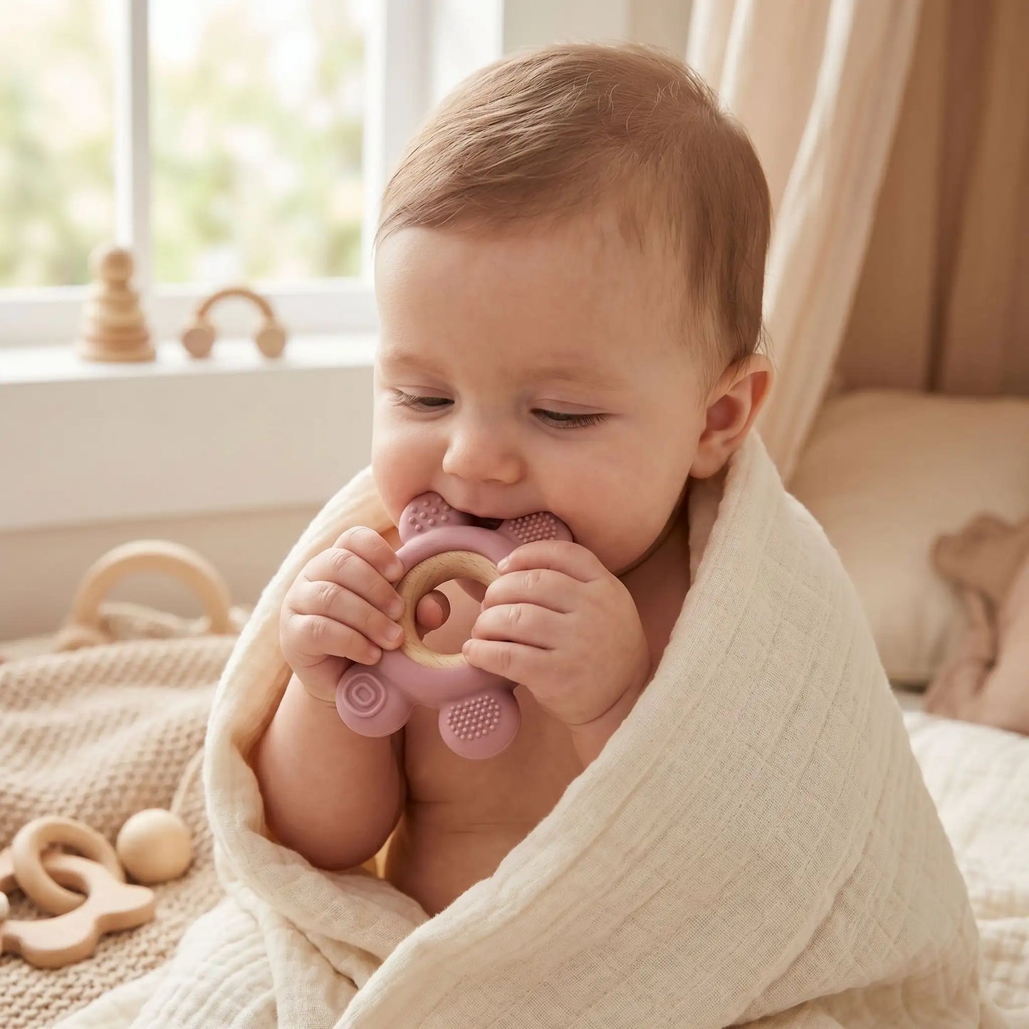 anneau de dentition bebe assis rose