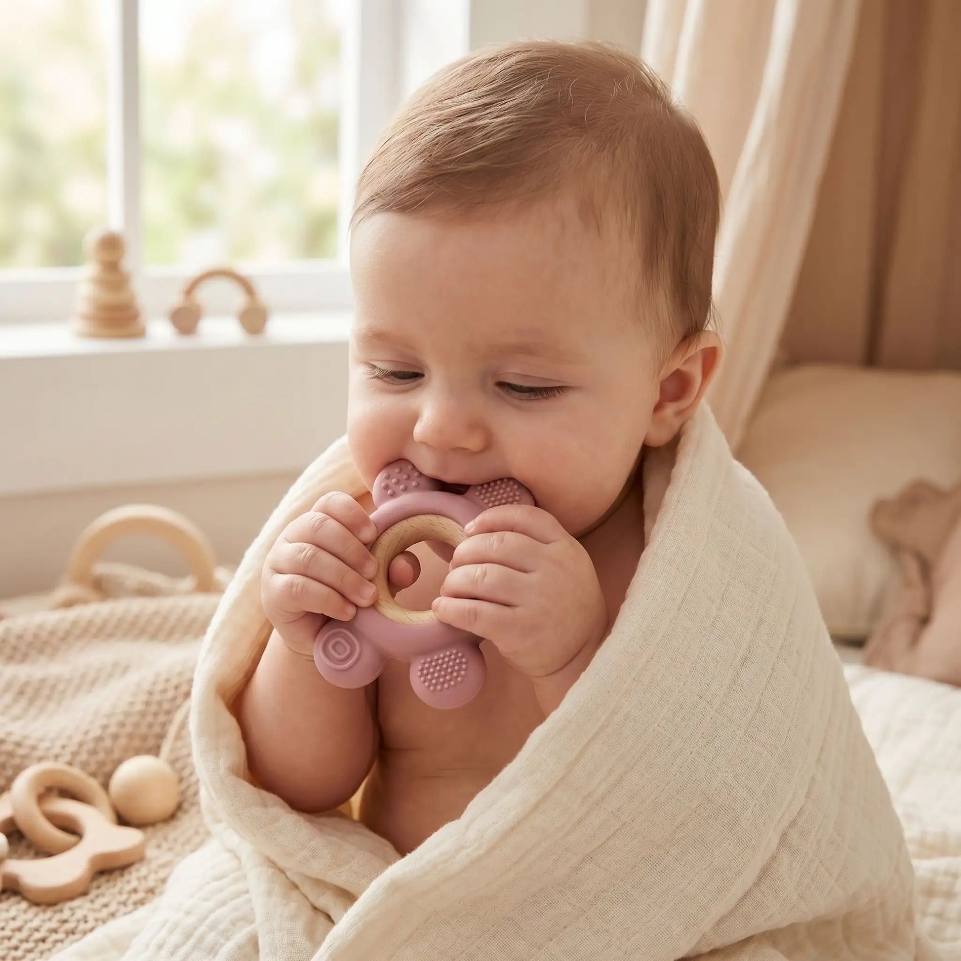 anneau de dentition bebe assis rose