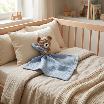 doudou bebe ours bleu lit