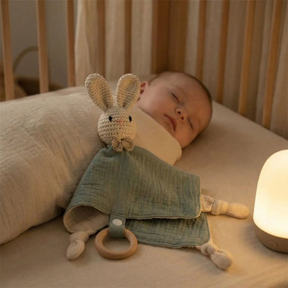 doudou lapin rose dort bebe