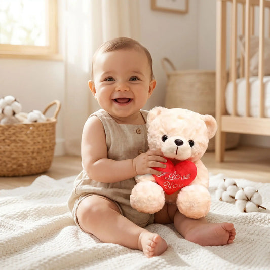 gros ours en peluche blanc assis bebe