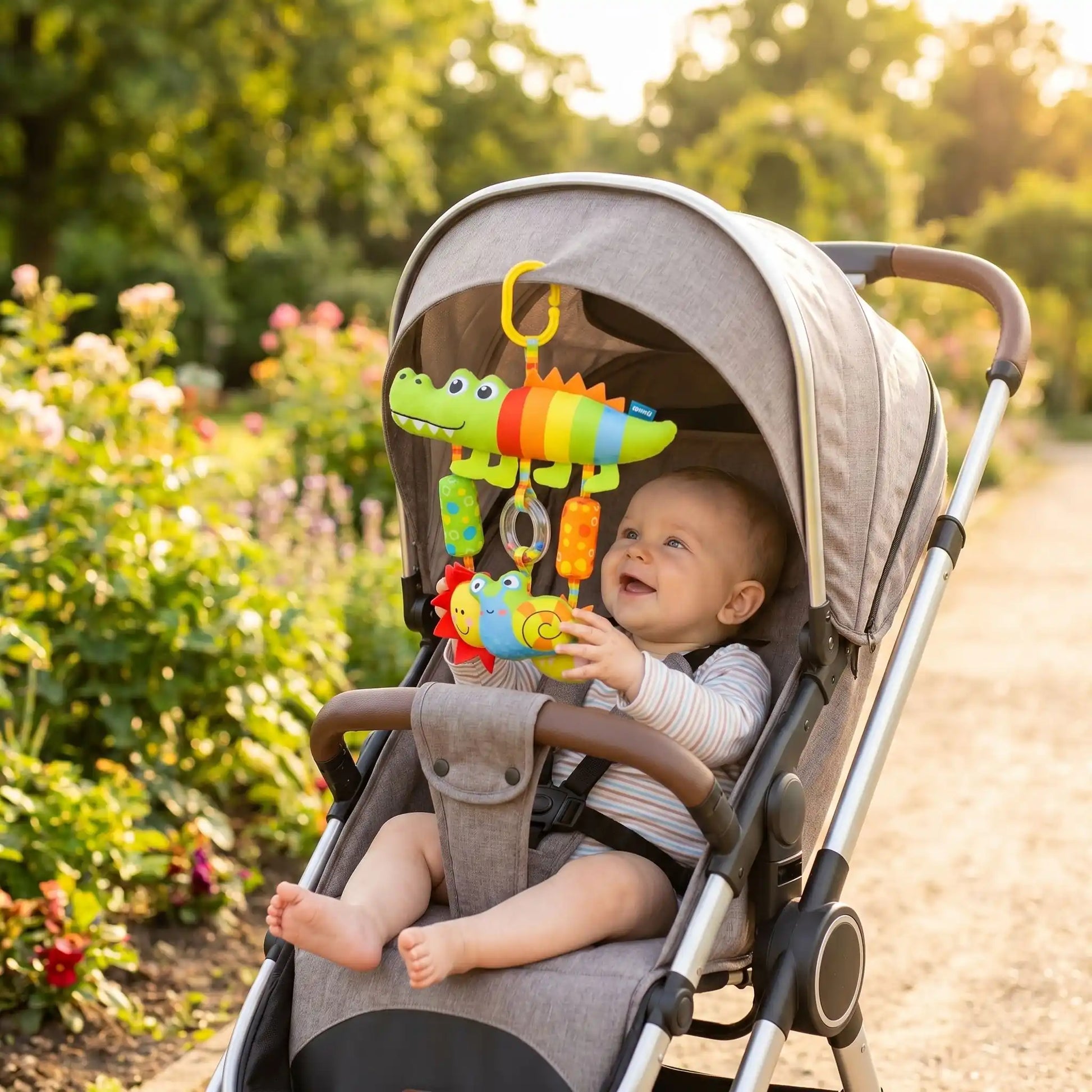 jouet pour bebe suspendu croco pousette