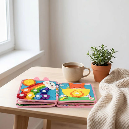 livre bebe en tissus table rose