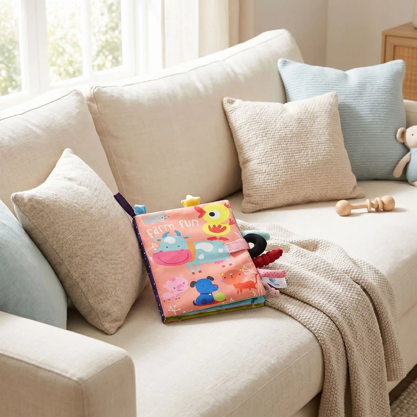 livre bebe rose divan coussin