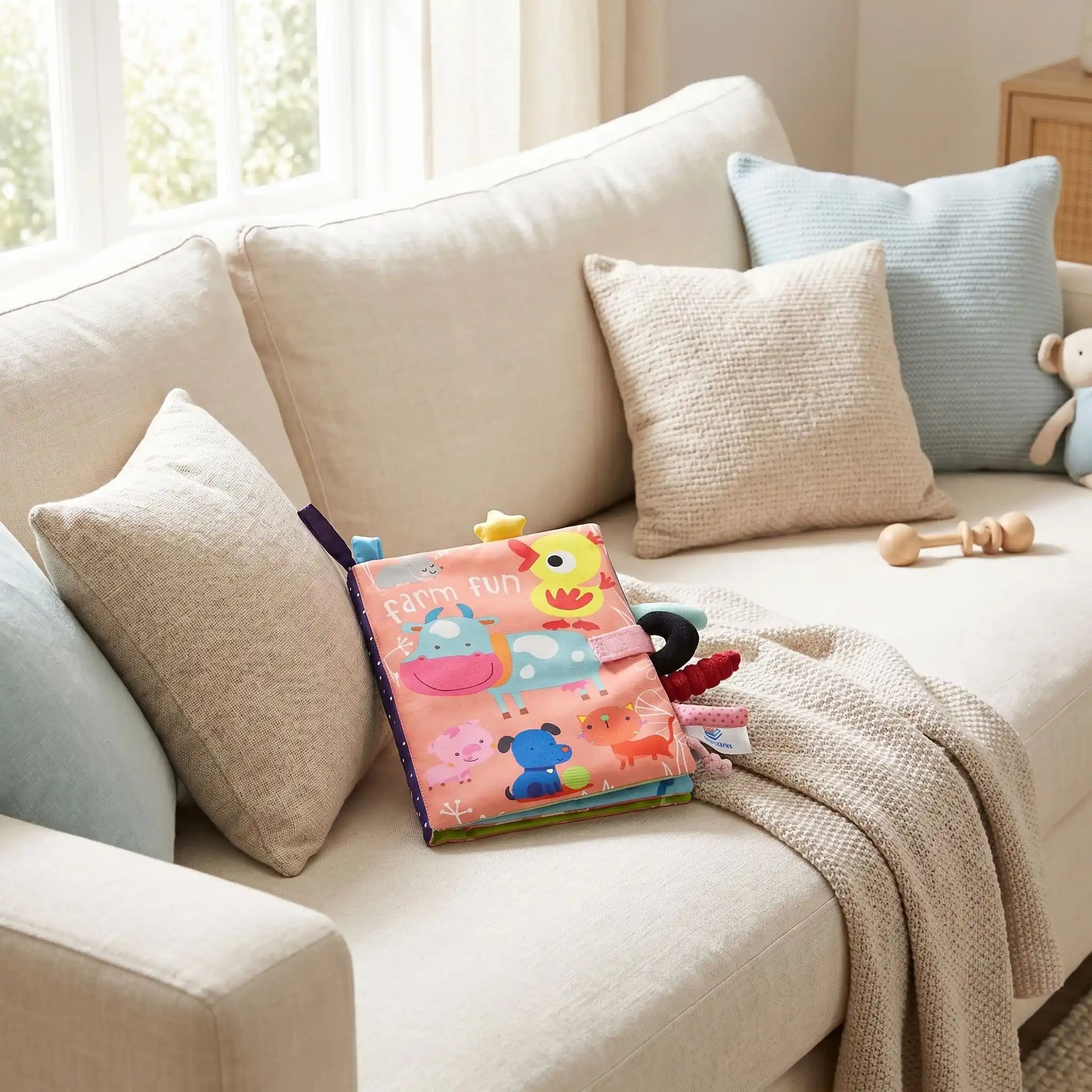 livre bebe rose divan coussin