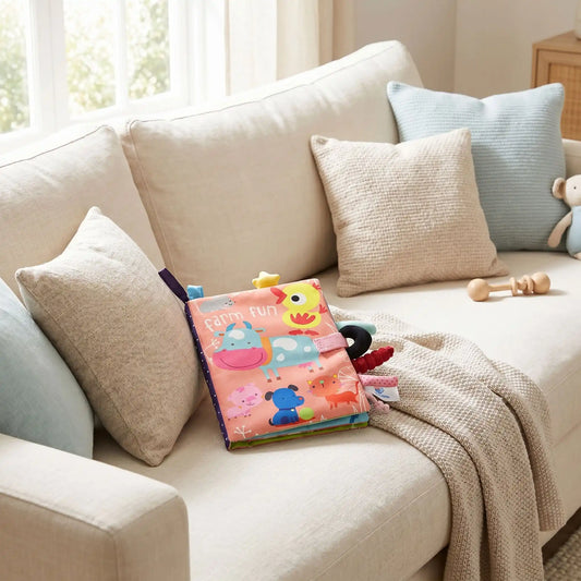 livre bebe rose divan coussin