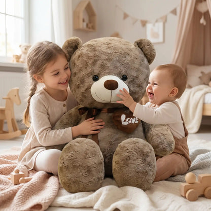 ours en peluche geante soeur bebe