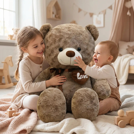 ours en peluche geante soeur bebe