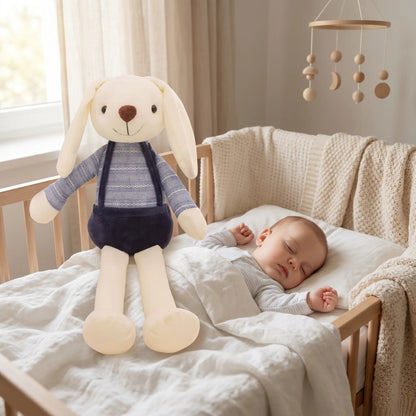peluche lapin bebe dort bleu berceau