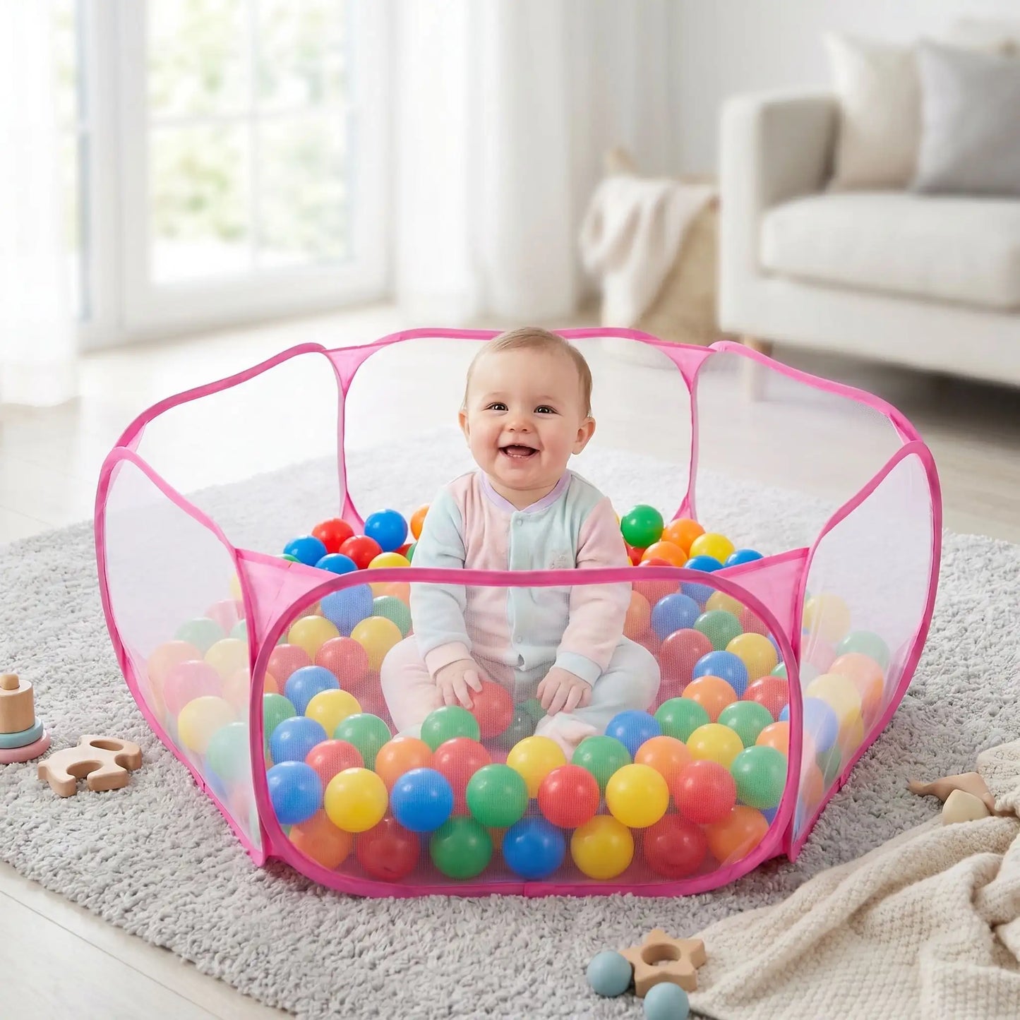piscine a balle rose bebe sourire