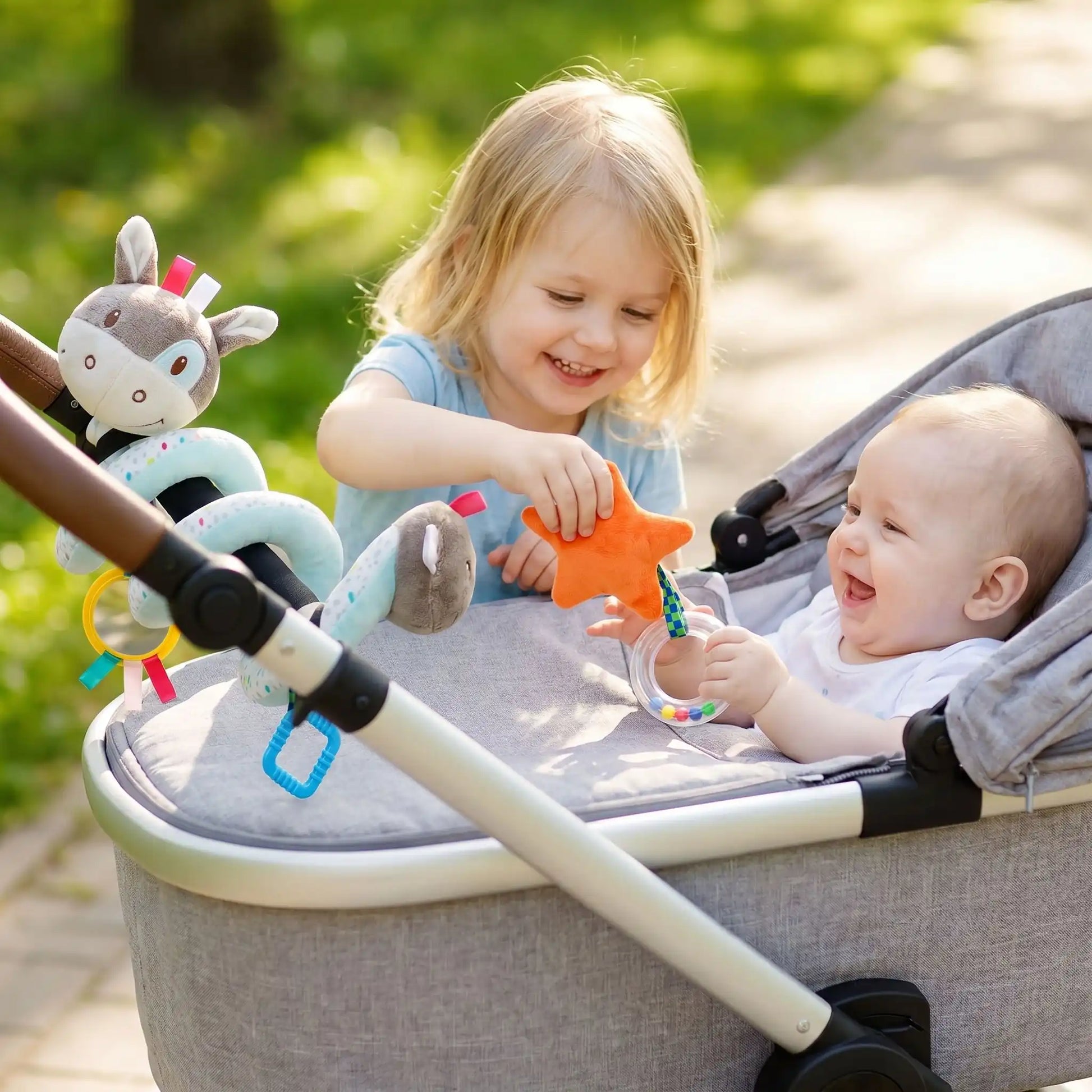 spirale dactivite bebe singe soeur poussette
